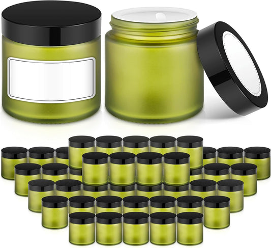 2 oz Small Glass Jars with Lids, Bumobum 48 pack Round Green Glass Candle Jars with Black Lids, White Labels & Inner Liners, Empty Cosmetic Containers for Cream, Lotion, Slime, Ointment