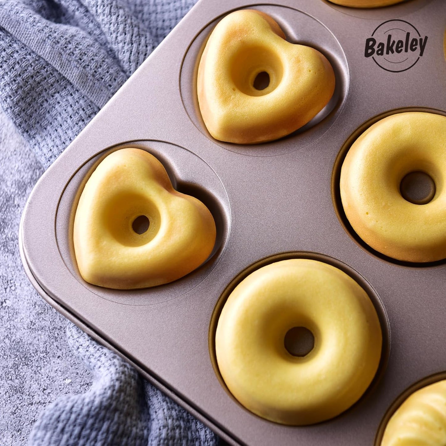 Donut Mold Cake Pan, 12-Cavity Non-Stick Ring Doughnut Bakeware for Oven Baking (Champagne Gold)