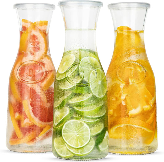 Glass Carafe Pitchers, by Kook, Large Carafe - set of 3, Beverage Dispensers, Clear Jugs For Mimosas, Water, Wine, Milk and Juice, with Plastic Lids, 50 oz Dishwasher Safe